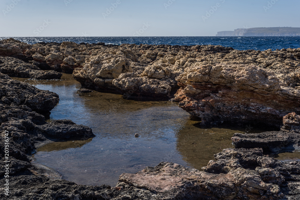 Photo of Sea water beating against rock, Cirkewwa, Malta