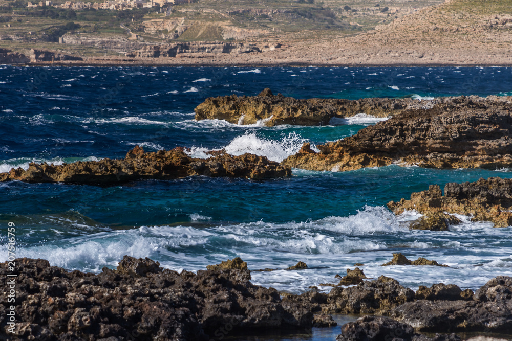 Photo of Sea water beating against rock, Cirkewwa, Malta Photo of Sea water beating against rock, Cirkewwa, Malta