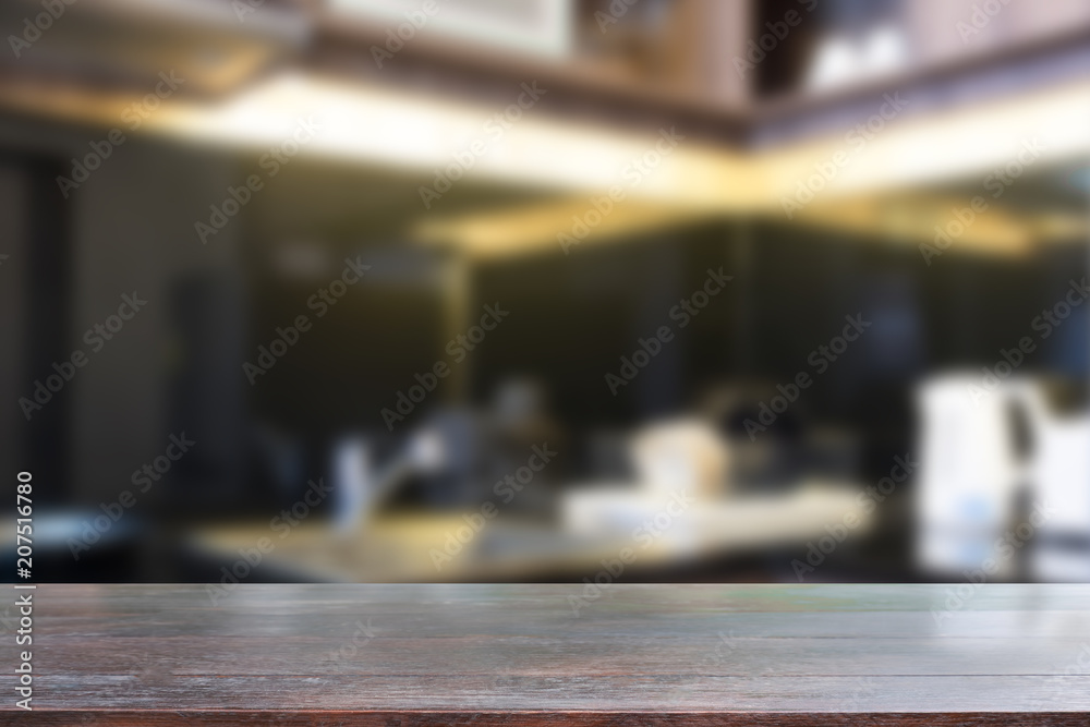 Wood desk table dark tone on kitchen room blur background.