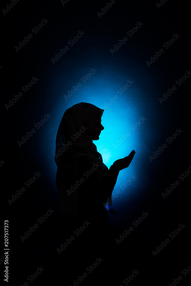 silhouette of muslim woman praying silhouette of muslim woman praying