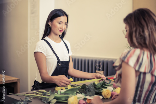 Choosing flowers at the shop photo