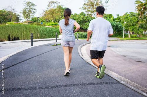 Couple running in the park.