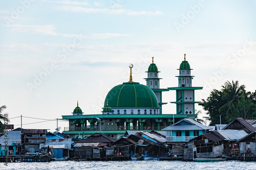 Masjid Nurul Huda Mosque in Yellu village at sunset, east Misool, Indonesia