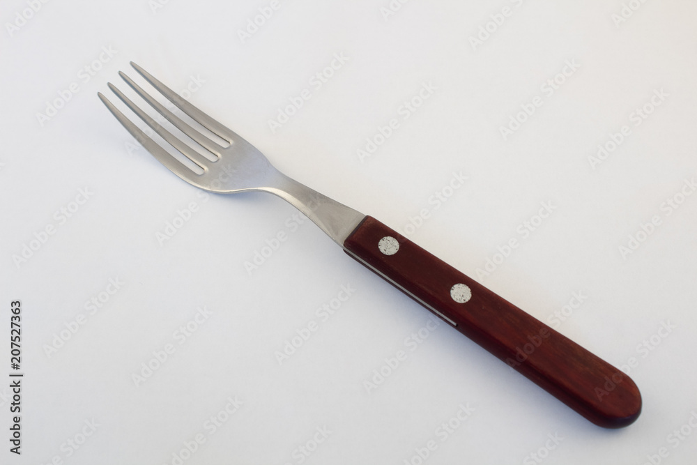 Fork with wooden handle on white background Fork with wooden handle on white background