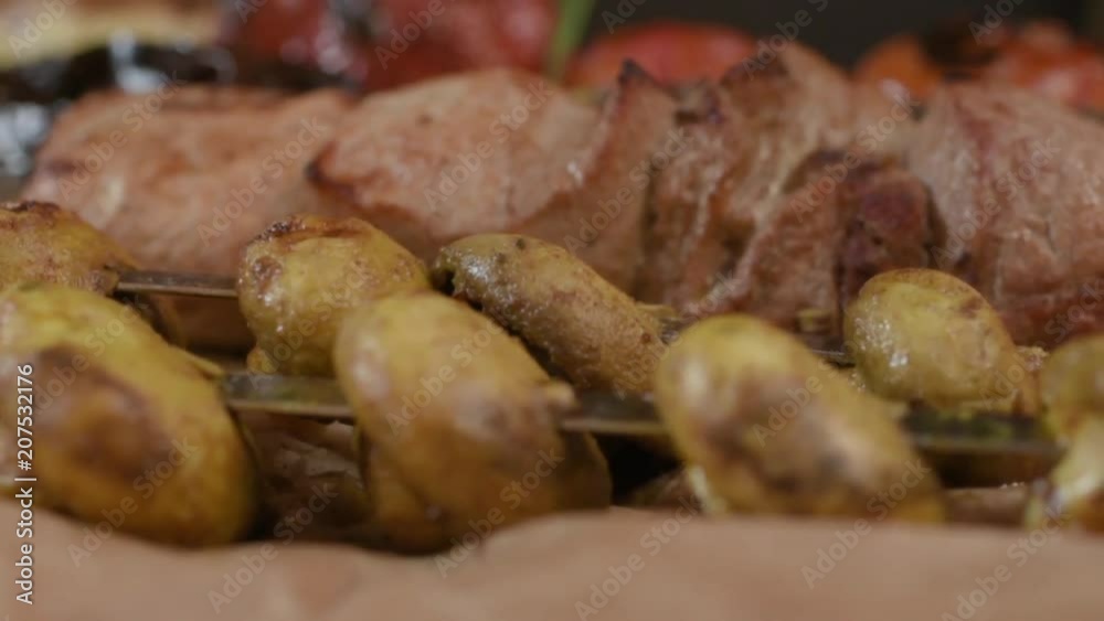 Shish kebabs from pork, tomatoes, mushrooms, zucchini. Caucasian kitchen. Men's favorite food Rotation Shish kebabs from pork, tomatoes, mushrooms, zucchini. Caucasian kitchen. Men's favorite food Rotation