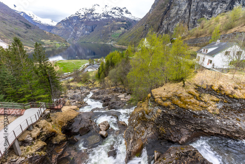Waterfall walk in Geiranger with Geirangerfjord in the background, Norway
