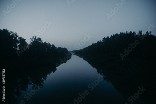misty moody morning on a river 