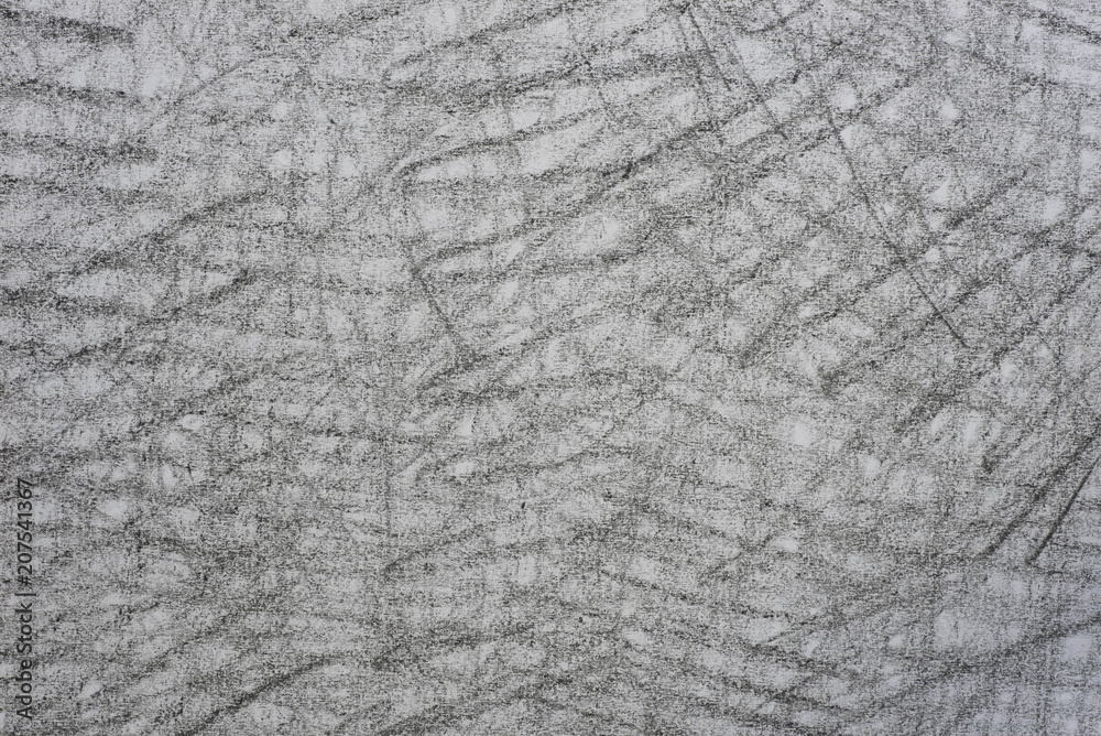 gray crayon doodles on paper background texture