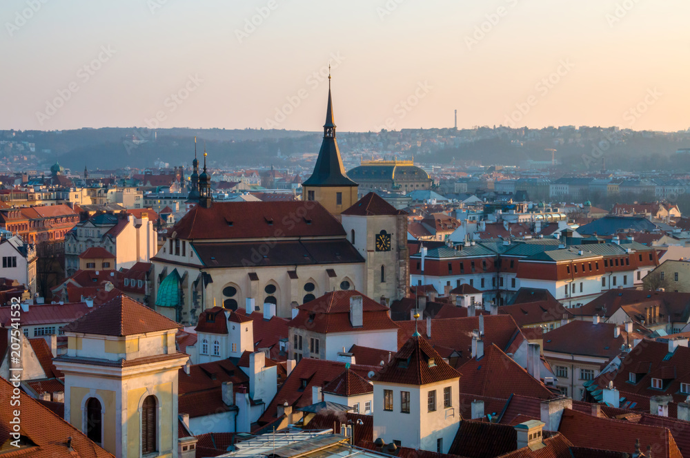 Obraz premium Sunset in Prague, Czech Republic. Aerial view at the scenic cityscape with red roofs of old town