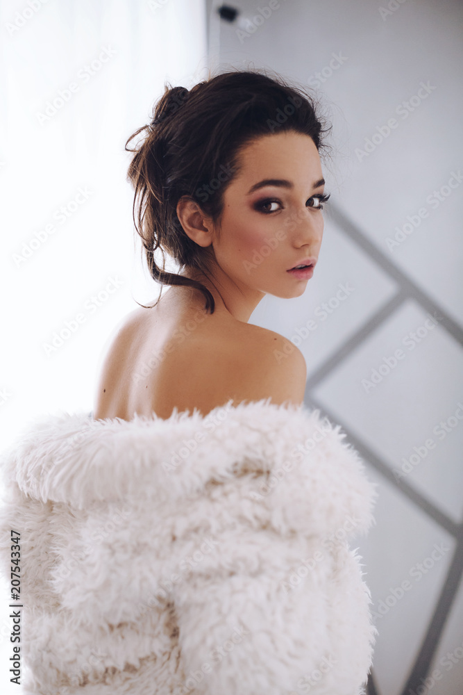 Portrait of beautiful young brunette woman with makeup Portrait of beautiful young brunette woman with makeup