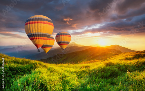 Air ballon above mountains at the summer time. Concept and idea of adventure