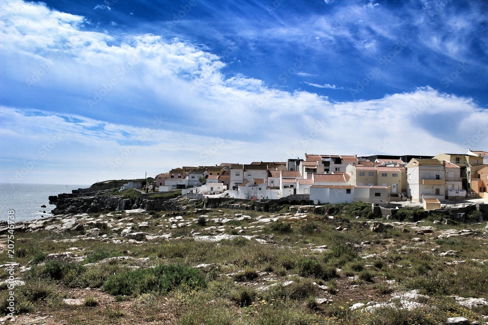 Views of the Peniche village and wild Atlantic Ocean with beautiful cliffs