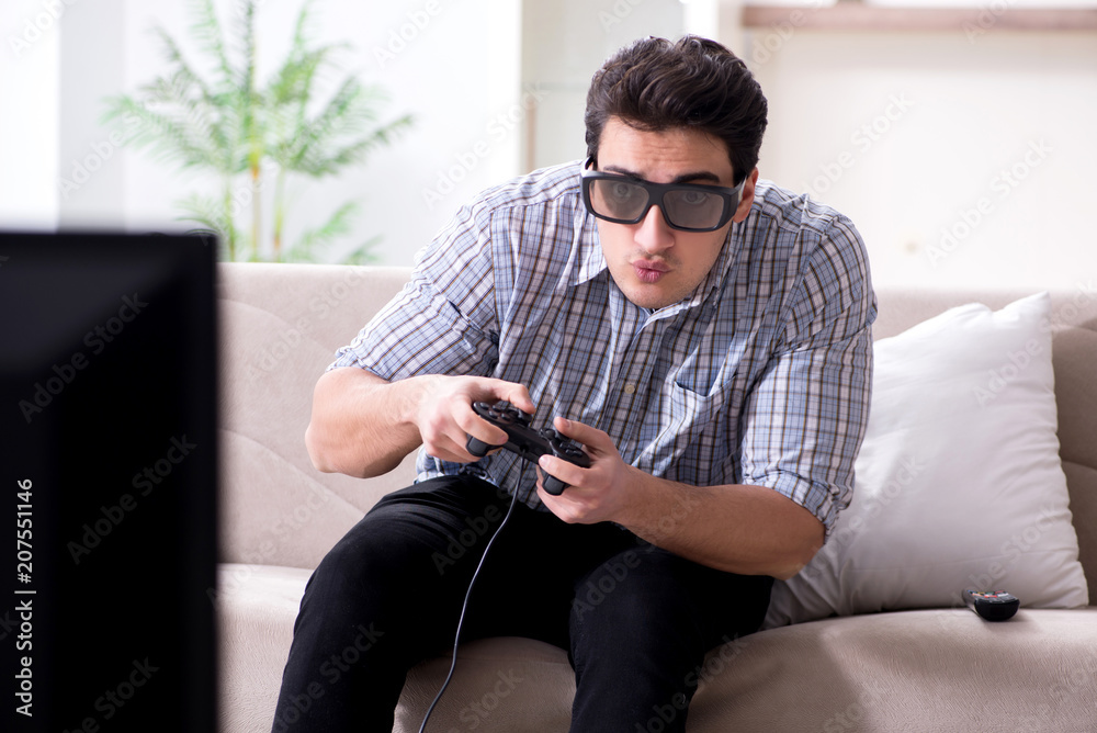 Man playing 3d games at home Man playing 3d games at home