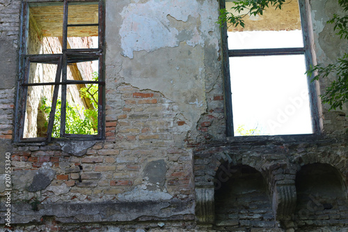 two old broken windows in castle