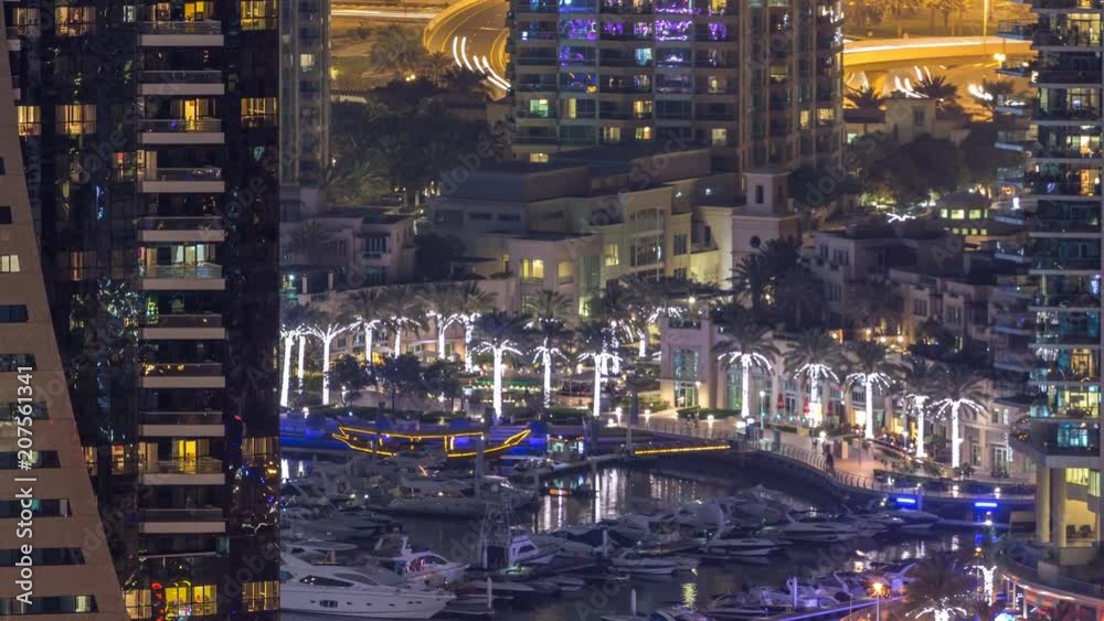 Water canal on Dubai Marina skyline at night timelapse. Water canal on Dubai Marina skyline at night timelapse.