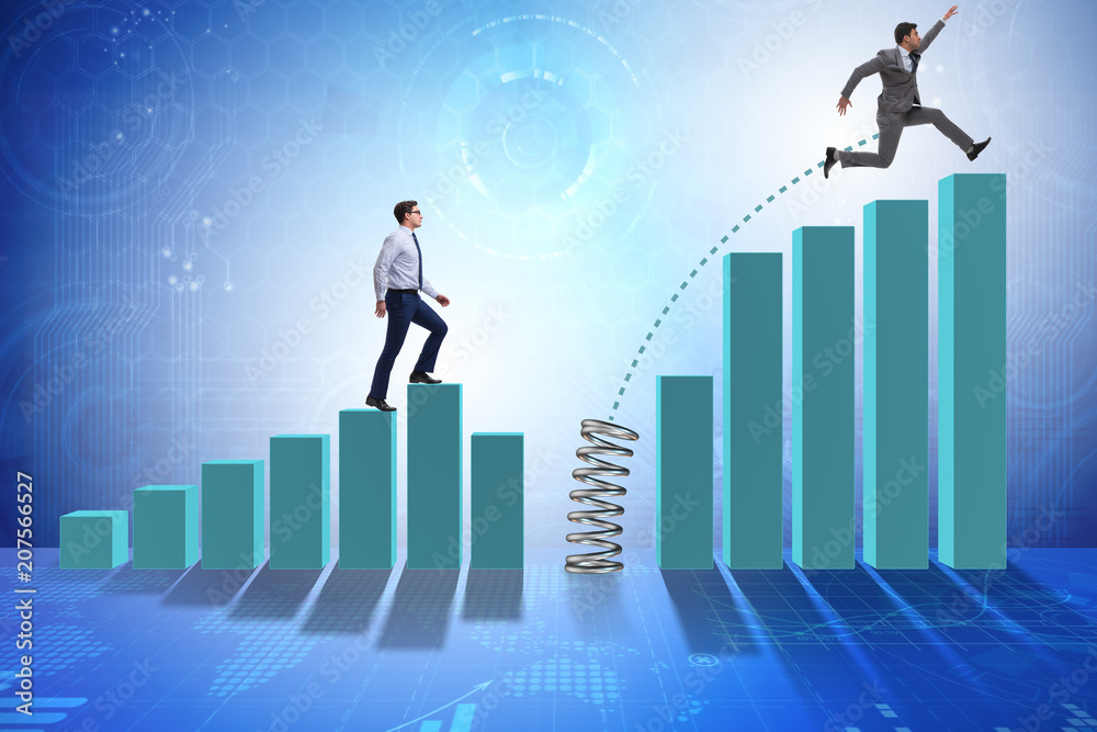 Business people jumping over bar charts Business people jumping over bar charts