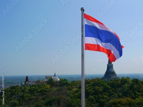 National flag of Thailand and Buddhist temple