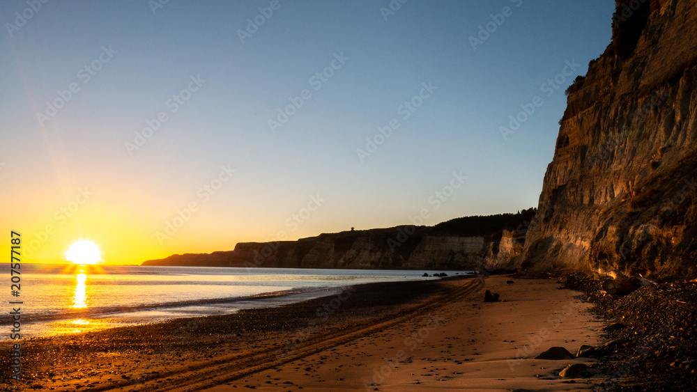 Beautiful beach sunrise shot during coastal hike to Cape Kidnappers located in Hawke´s bay, North Island area of New Zealand