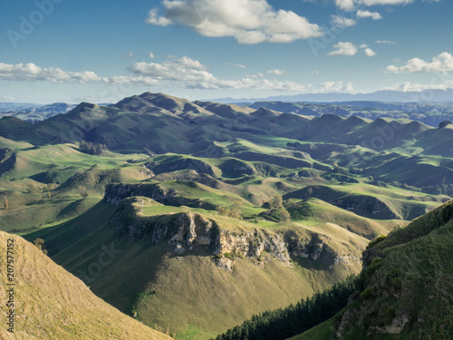 Rolling green hills and blue sky panorama shot from Te Mata Peak near Hastings, Hawke´s Bay region of North Island, New Zealand 