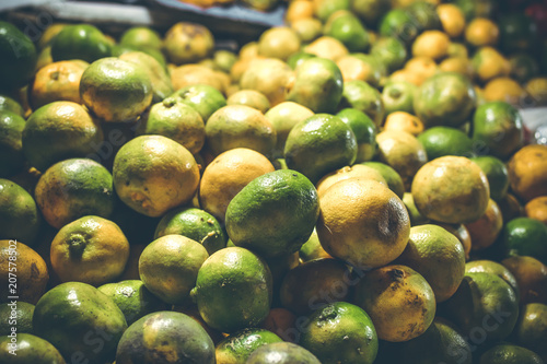 Fresh organic mandarins on the night market. Bali island. photo