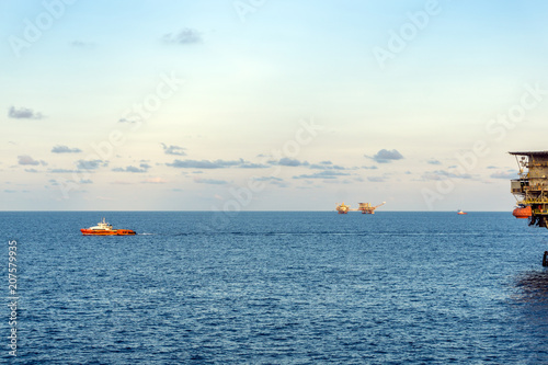 Fast crew boat leaving oil platform