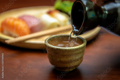 sake cup with sushi