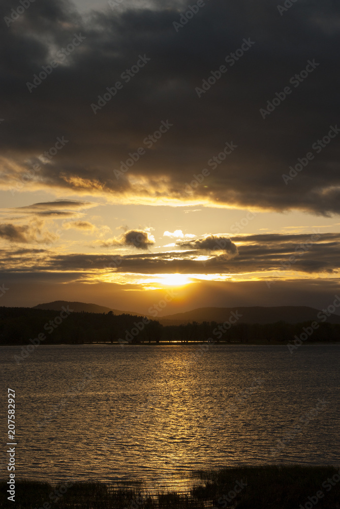 Golden Sun Setting on the Hills of the River Golden Sun Setting on the Hills of the River