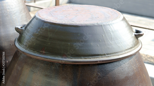 Close-up image of a pot lid.