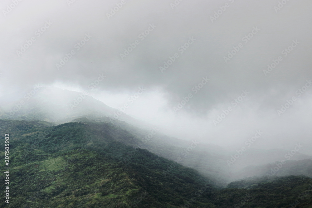 Moody fog over mountain scenery in rainy day. Moody fog over mountain scenery in rainy day.