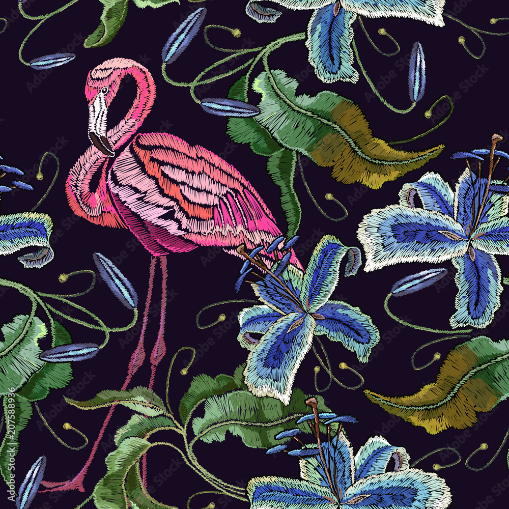 Obraz premium Embroidery flamingo and violet orchid flowers tropical seamless pattern. Fashionable embroidery pink flamingos, tropical summer background. Template for design of clothes
