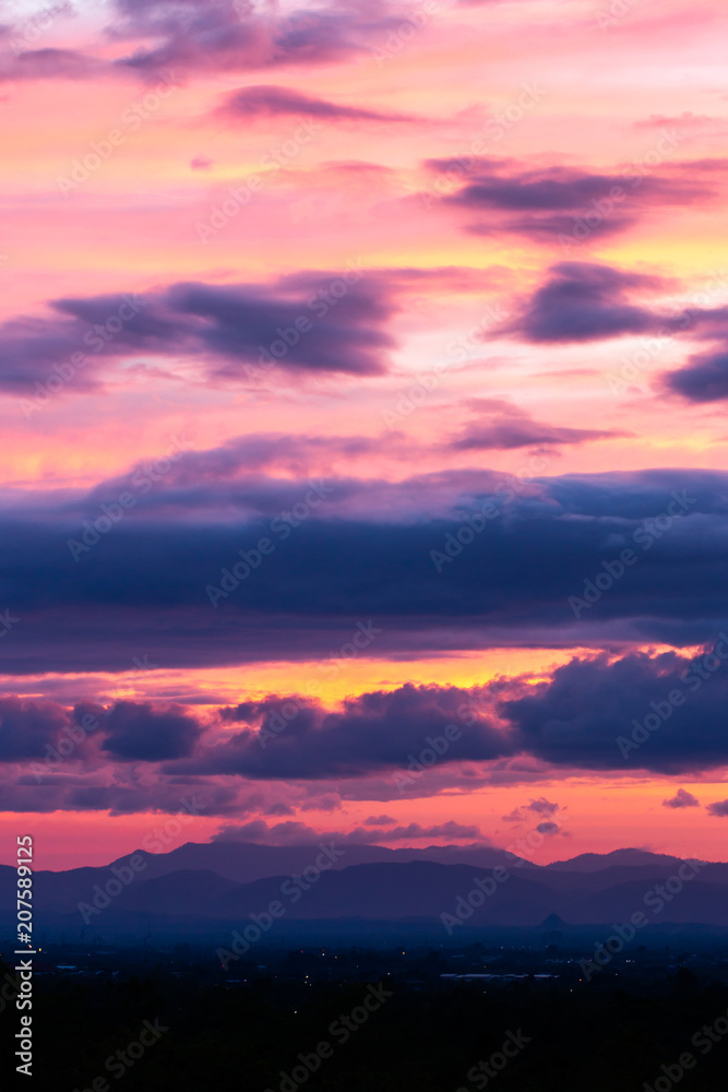 colorful dramatic sky with cloud at sunset.
