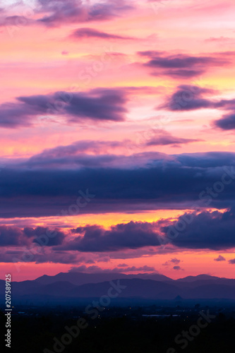 colorful dramatic sky with cloud at sunset.