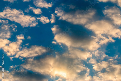 colorful dramatic sky with cloud at sunset.