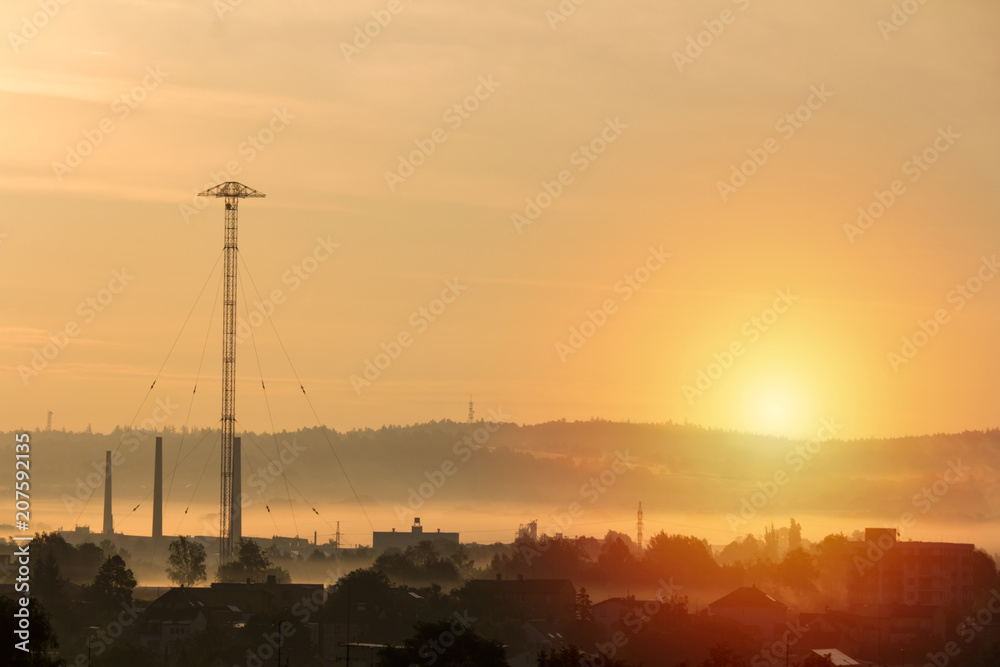 Sunrise over city Ceske Budejovice with hills