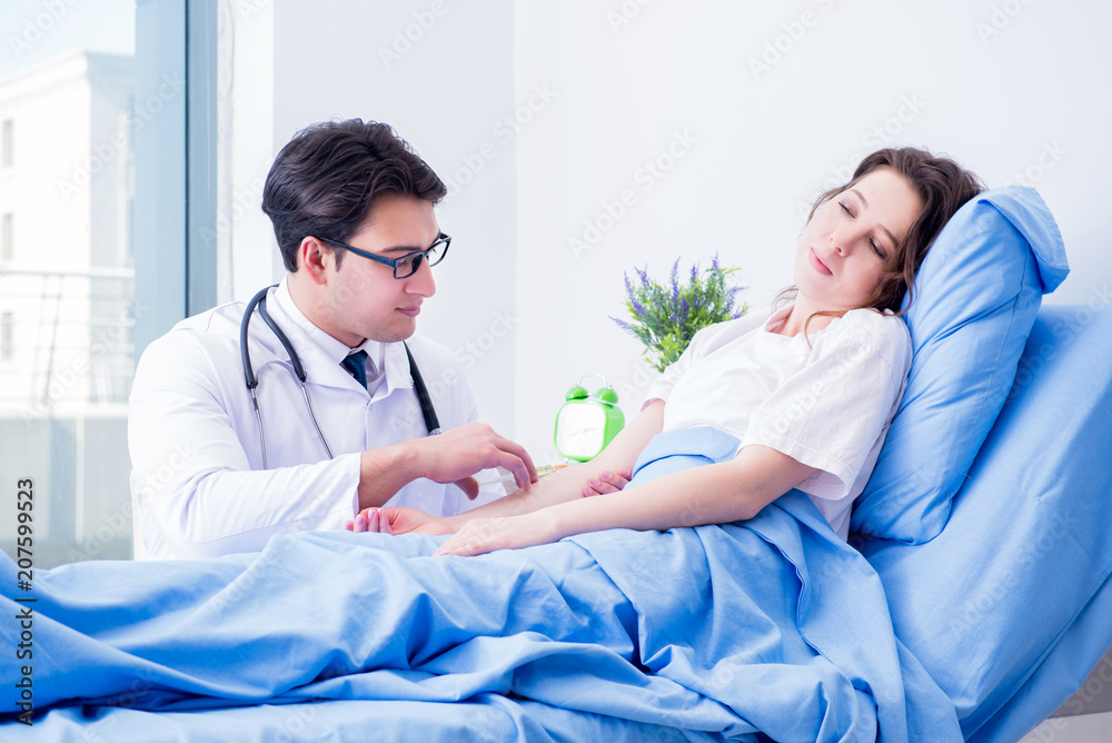 Fototapeta premium Doctor doing medical injection in hospital room