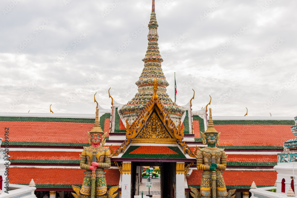 Fototapeta premium Temple of the Emerald Buddha is Wat Phra Kaew or Wat Phra Si Rattana Satsadaram. It is regarded as the most sacred Buddhist temple (wat) in Thailand.