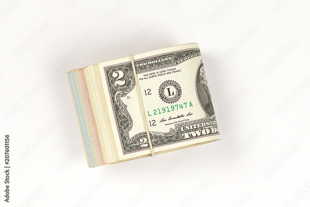 Stack of USA 2 dollars isolated on white background. Stack of USA 2 dollars isolated on white background.