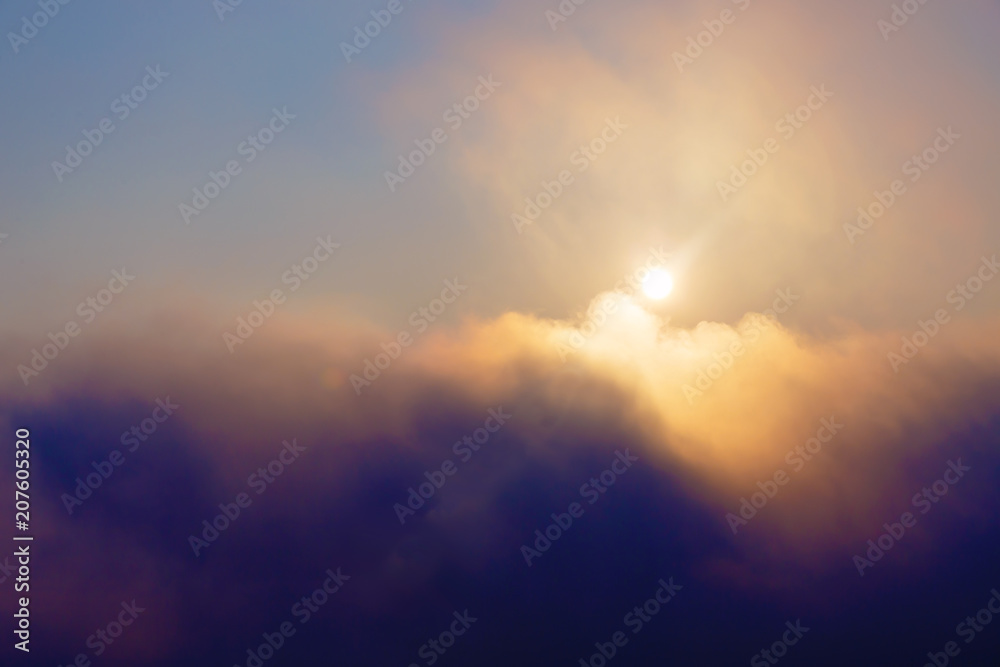 Beautiful morning clouds with sun. Morning landscape in fog.