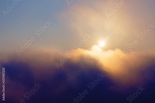 Beautiful morning clouds with sun. Morning landscape in fog.