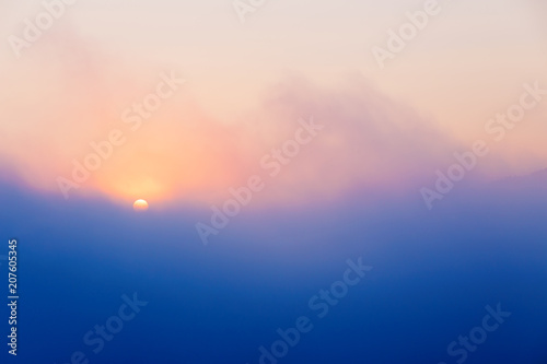 Beautiful morning clouds with sun. Morning landscape in fog.