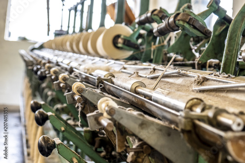 Cop winder of historic woolen mill production in Wales - United Kingdom photo