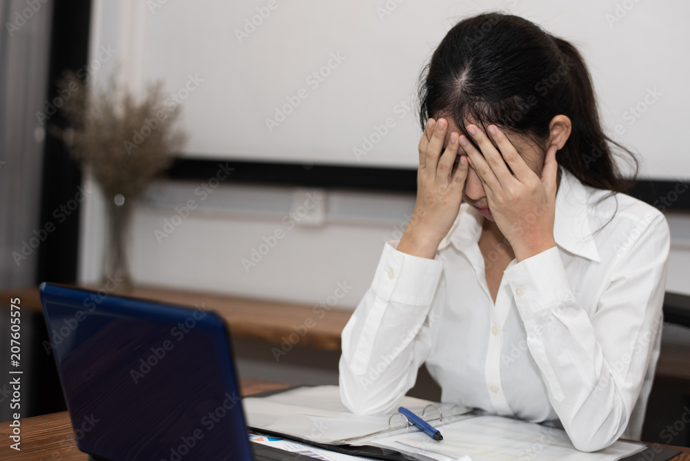 a woman in feeling exhausted and depressed from frustrated. anxiety concept. a woman in feeling exhausted and depressed from frustrated. anxiety concept.