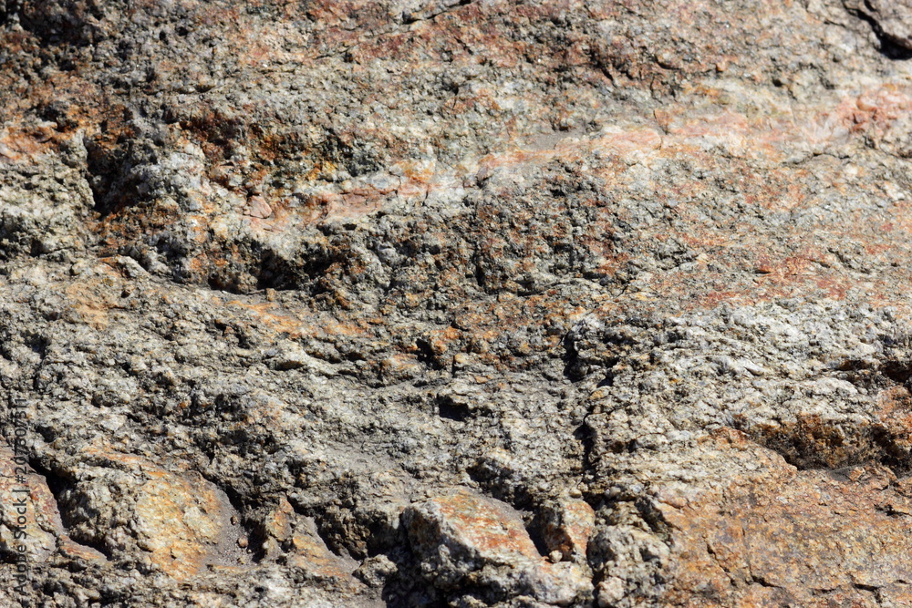 Granite surface, texture of old stone, blank for designer from natural material, granite pattern in vintage style, brown background for wallpaper Granite surface, texture of old stone, blank for designer from natural material, granite pattern in vintage style, brown background for wallpaper