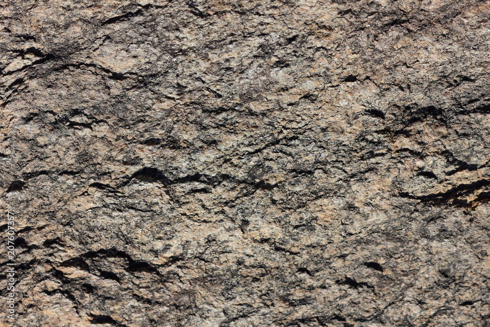 Granite surface, texture of old stone, blank for designer from natural material, granite pattern in vintage style, brown background for wallpaper Granite surface, texture of old stone, blank for designer from natural material, granite pattern in vintage style, brown background for wallpaper
