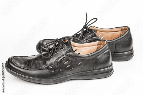 Black leather male shoes, white background