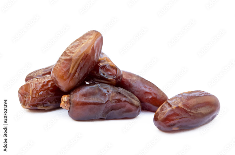 Dried sweet dates isolated on a white background Dried sweet dates isolated on a white background