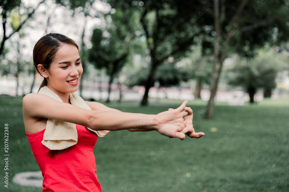 portrait strength woman stretching bicep muscle. portrait strength woman stretching bicep muscle.