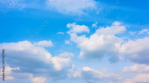 Blue sky with fast white heap clouds - 4K timelapse
