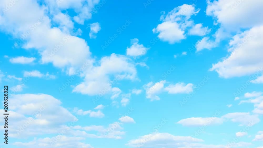 Light blue sky and white cumulus clouds - Seamless loop timelapse 4K