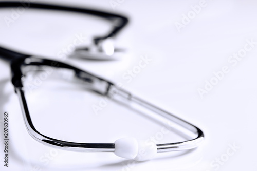 Stethoscope isolated on the white table background.